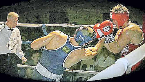 BIG BLOW: Imbil Police Station senior constable Bill Greer lands a powerful blow against Brisbane firefighter Matthew Keating during the Police vs Firies Charity Boxing Night in Nambour at the weekend. BIG BLOW: Imbil Police Station senior constable Bill Greer lands a powerful blow against Brisbane firefighter Matthew Keating during the Police vs Firies Charity Boxing Night in Nambour at the weekend.